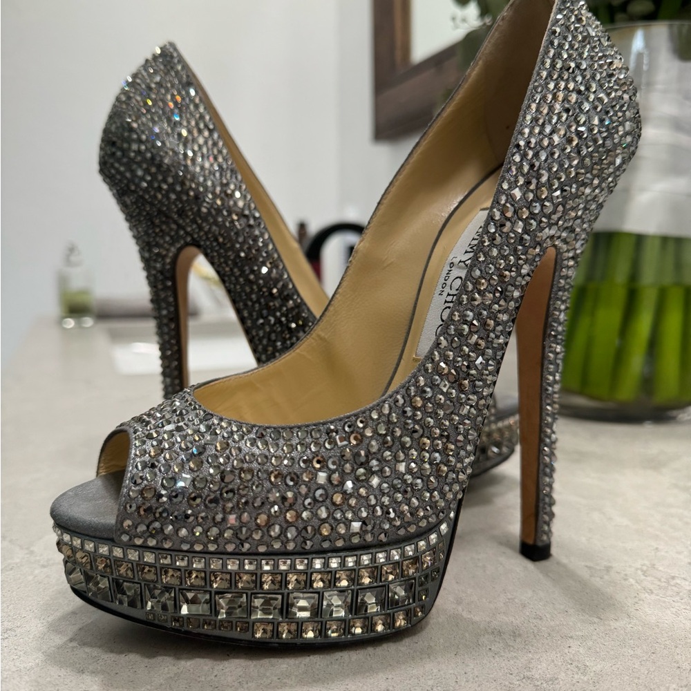 Jimmy Choo Crystal Embellished
Visit >
Leather Kendall Platform Pumps..
